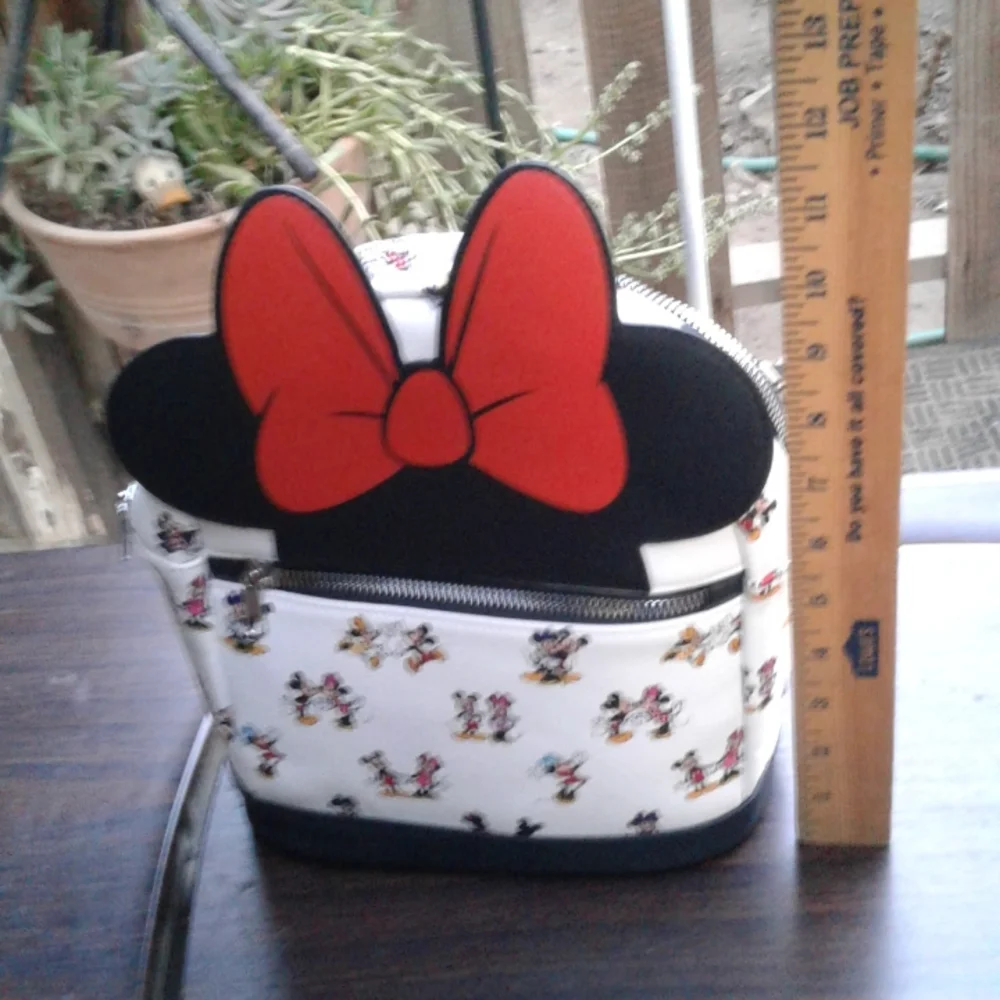 Minnie Mouse backpack 9 and 1/2 in torso with 9 in new with tags